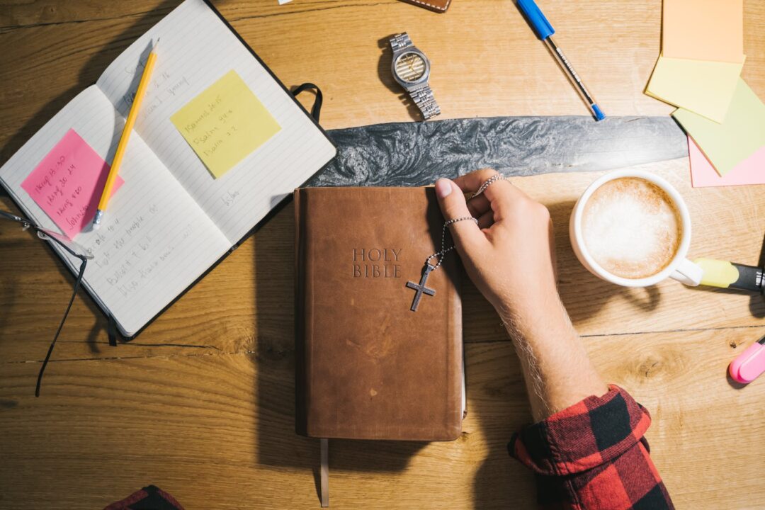 holy bible on wooden table